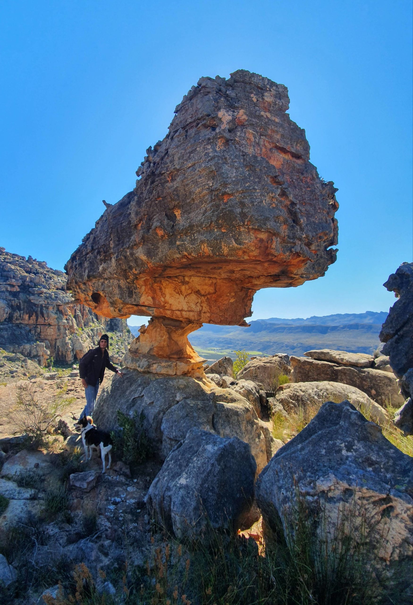 Lunch break under the balancing rock Geelberg, Cederberg, South Africa.