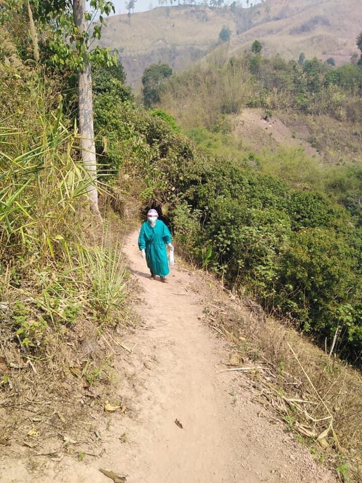 Doctor hikes and rides on a pillion across 2 mountains to visit kids with Covid quarantine.