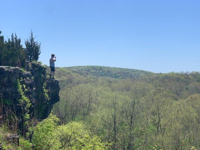 Just off the path and a little bit up that hill there, Bennett springs state park, Lebanon, MO, US. Got the tip from a couple of Mennonite girls as we got onto the trail. Glad we followed their directions.