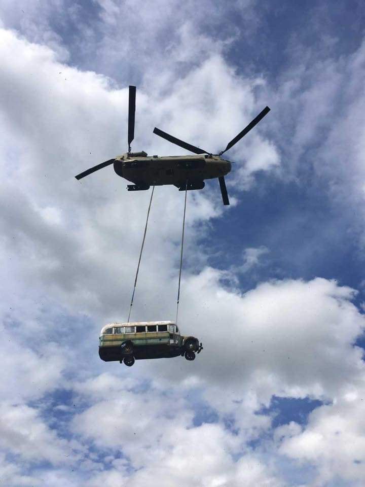 The Magic bus where Chris McCandless died was airlifted out of the site Thursday and relocated