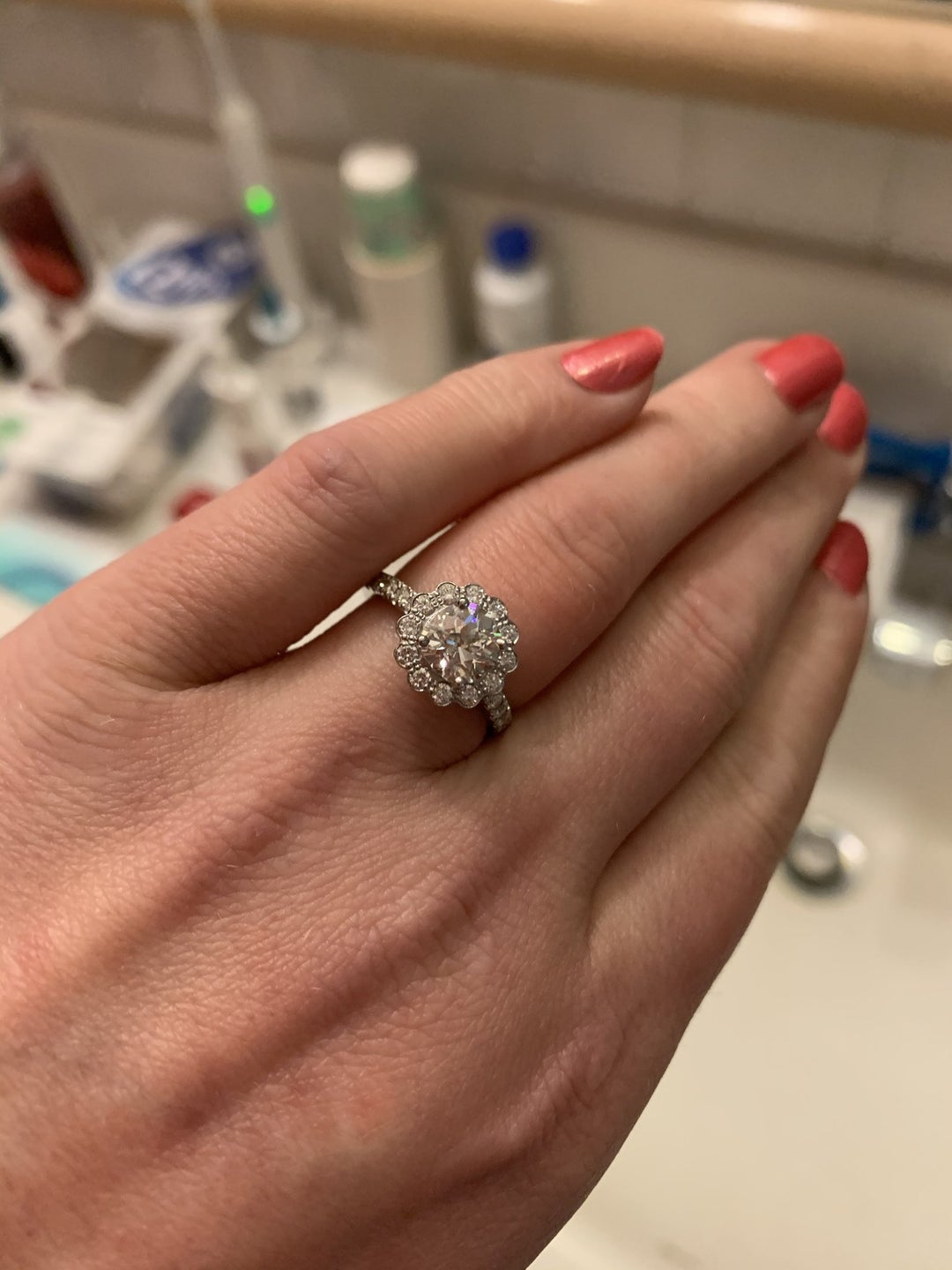 Finally I am no longer a lurker He proposed on top of a hill at the end of our hike. The center diamond is from my great grandfathers ring. So excited