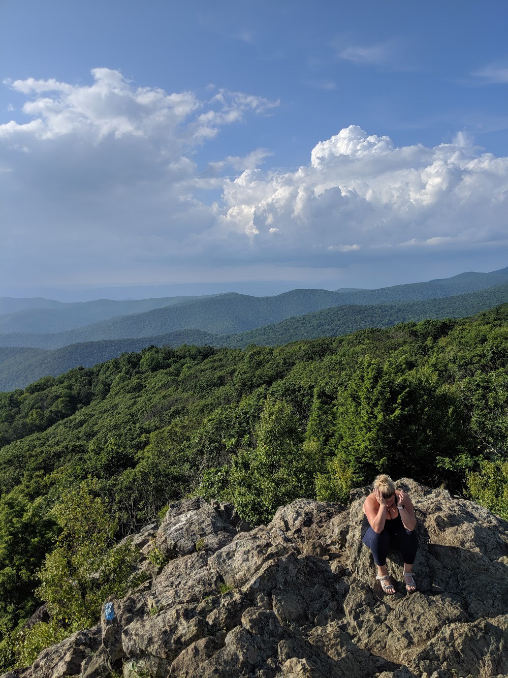 Bear Fence, Shenandoah National Park, Virginia, USA – When you tell your girlfriend Tevas probably arent suitable footwear for the rock scramble, but she doesnt believe you.