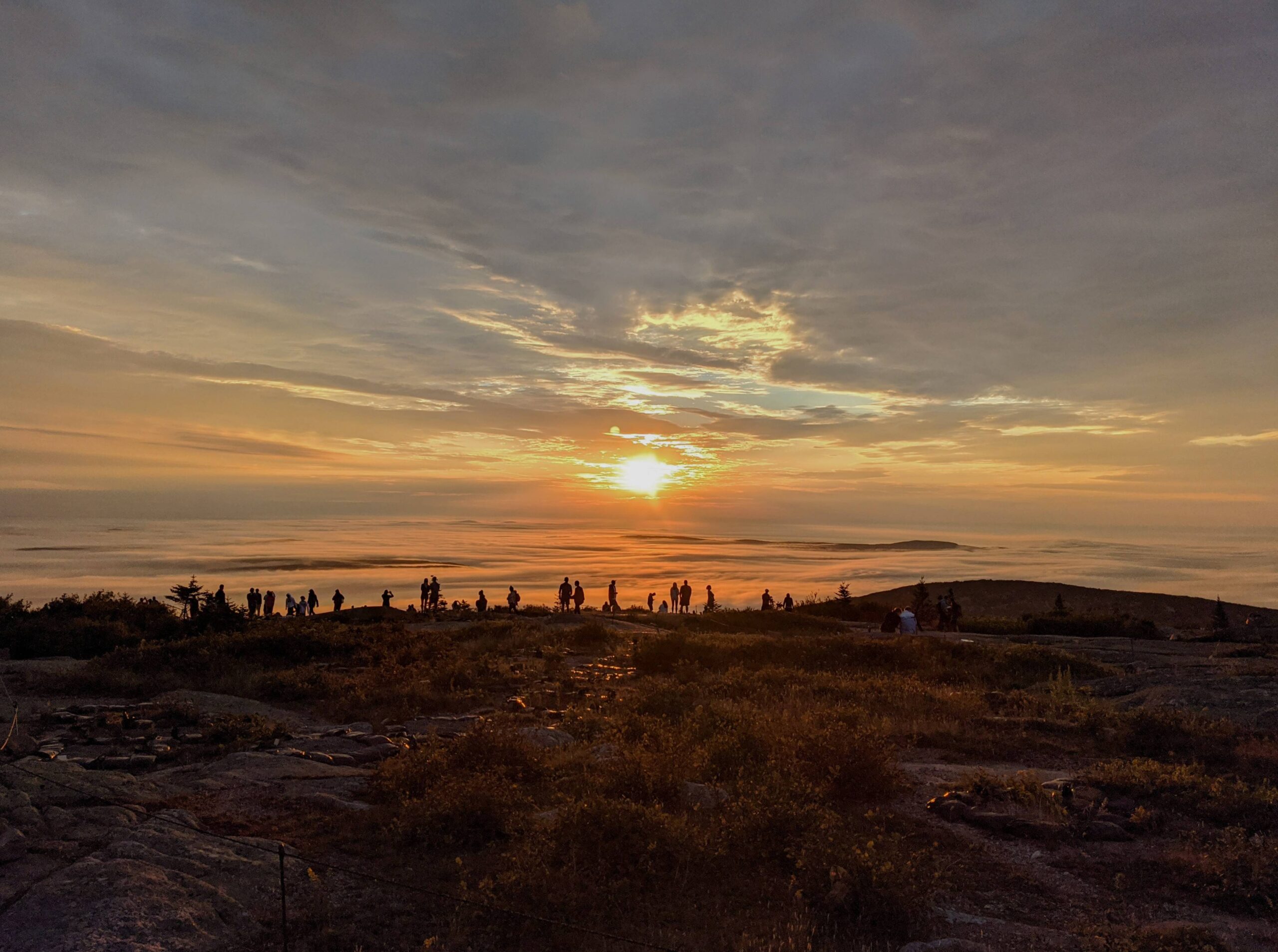 Sunrise from Cadillac Mountain in Maine. The first piece of the US to see sunlight every morning for most of the year.